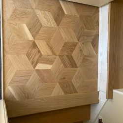 Geometric wood floor pattern with interlocking chevron and cube designs in natural tan tones